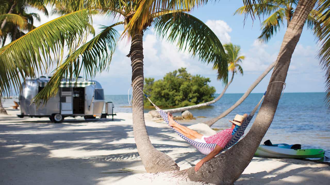 Image of person on beach after retirement.