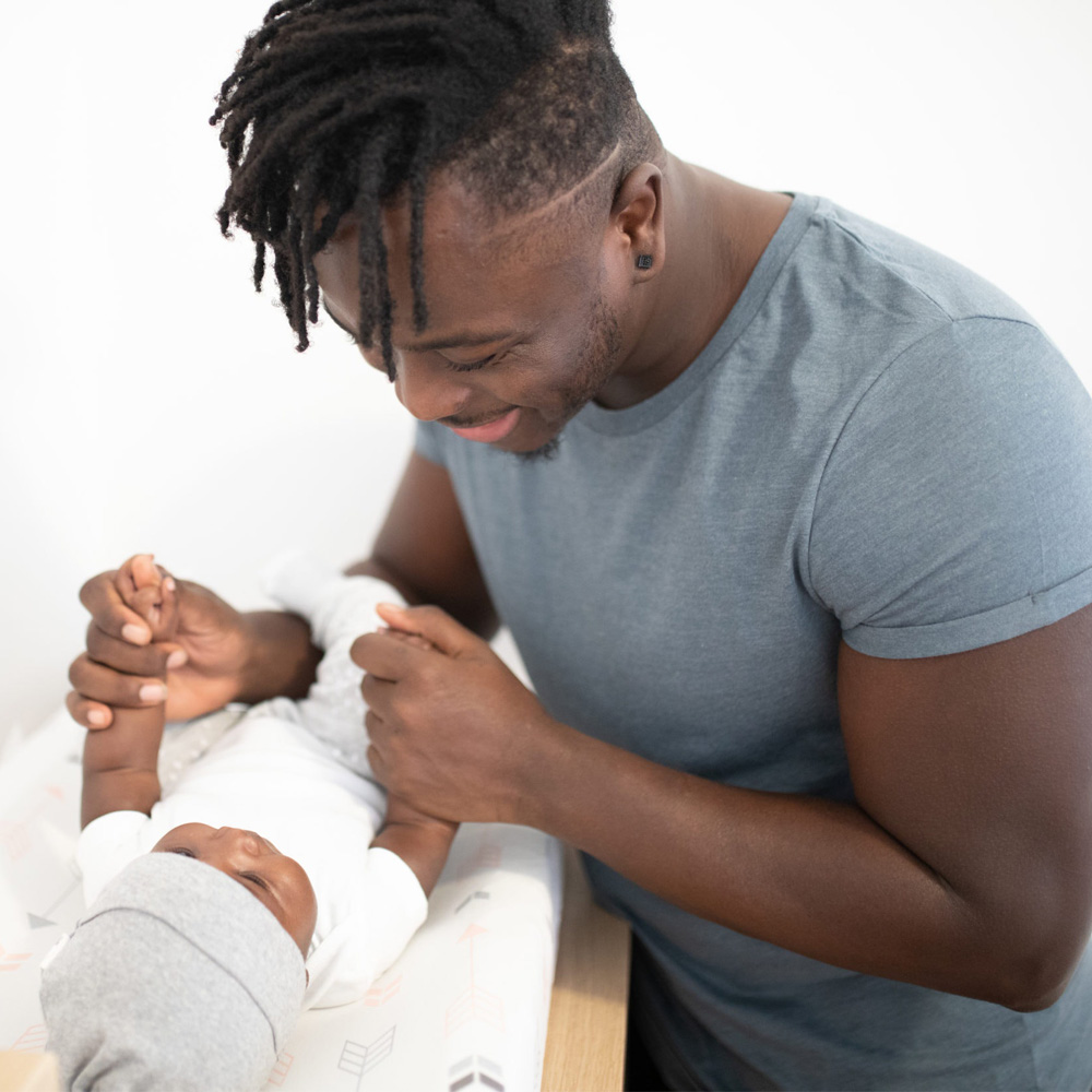 Young father with his new child.