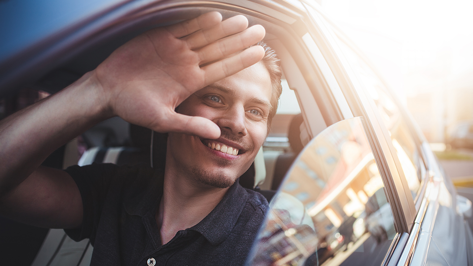 Young guy in car.