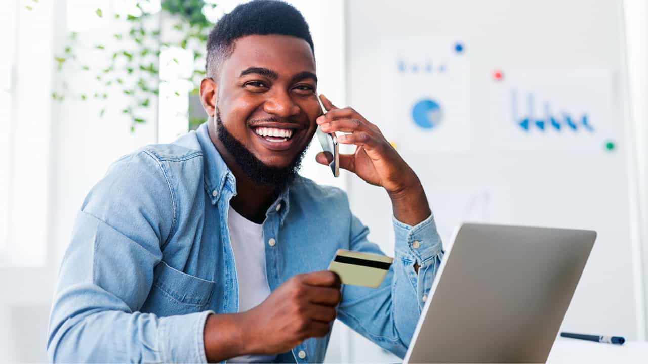 Thirty-something using his credit card online.